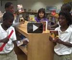 Immokalee Students, Happy for School Library’s New Books, Thank K is for Kids