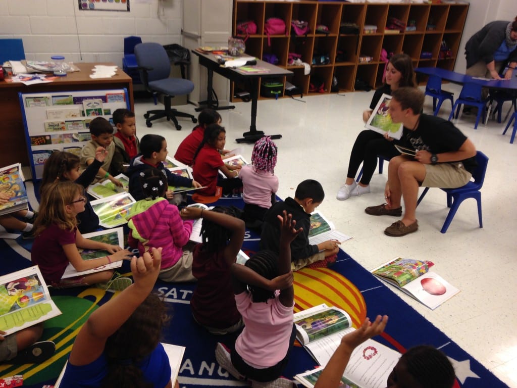 GCH_OperationOutreach_BGCCC_11-25-2013_GROUP_AlexPatrick_reading_lil-blur_116.07.18